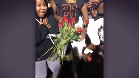 HS FOOTBALL COACH PROPOSES WITH HELP FROM TEAM