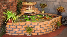 How to Transform Your Family Garden Into a Beautiful Corner With Waterfall Aquarium