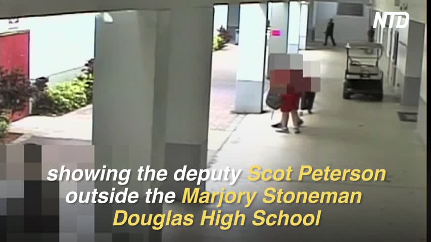 Surveillance video shows actions of armed deputy on duty during school shooting