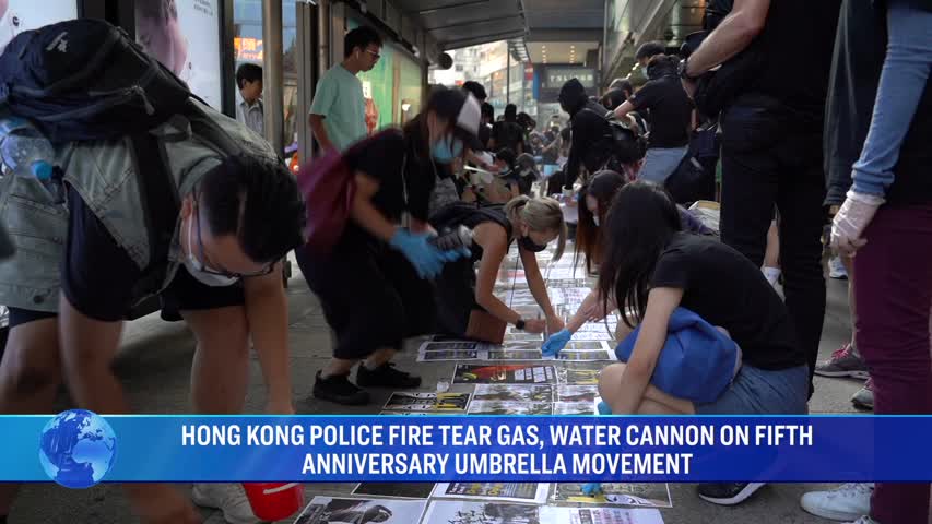 HONG KONG POLICE FIRE TEAR GAS, WATER CANNON ON FIFTH ANNIVERSARY UMBRELLA MOVEMENT