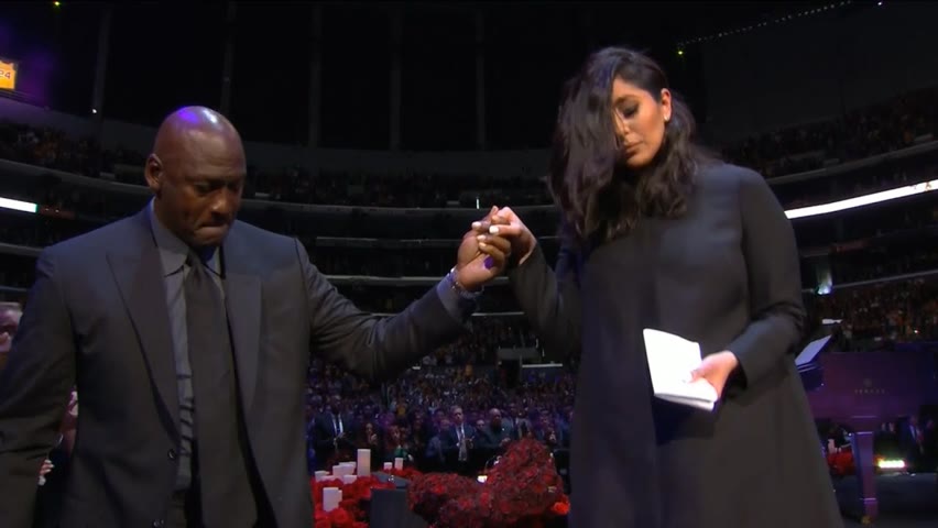 Michael Jordan helps Vanessa Bryant walk off stage at Gigi and Kobe Bryant memorial