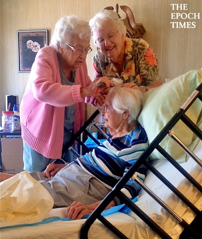 Grandmother Gets Hair Brushed by Her Sisters