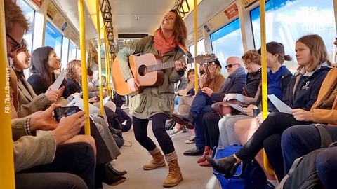 Brave Woman Inspires Train Sing Along