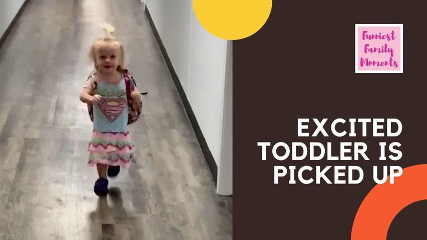 EXCITED TODDLER IS PICKED UP