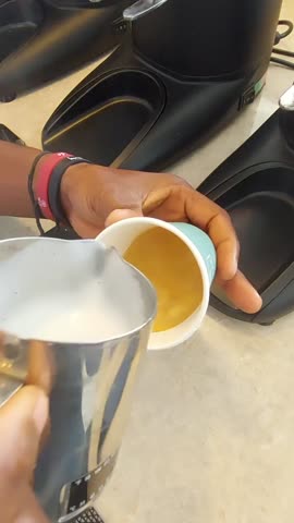 Classic Cortado coffee in a paper cup