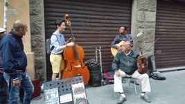 Bassist Player Joins Street Performers