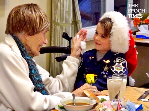 Little Officer Oliver Brings Festive Cheer to Nursing Home Residents