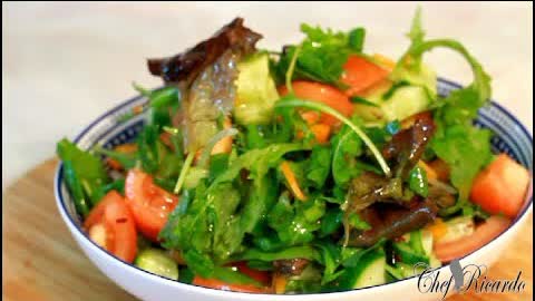 Mixed leaf salad with cucumber fresh tomato mix peppers spring onion honey Olive
