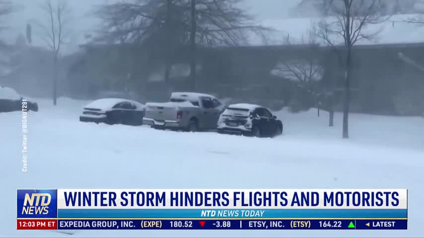 Winter Storm Hinders Flights and Motorists