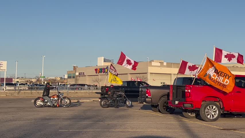 Bikers arrive at parking lot of St Laurent shopping centre on April 29, 2022