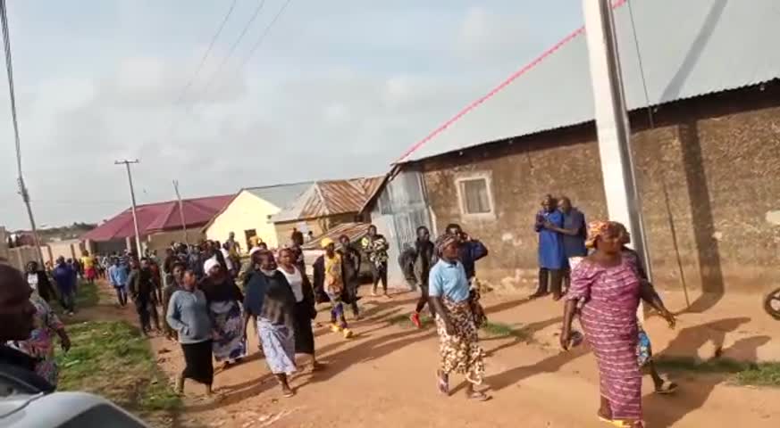 Villagers of Dong flee terrorists in Dong, Nigeria on May 24, 2021