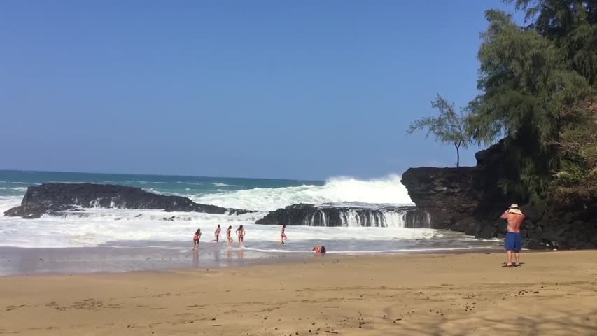 Giant Waves Crash into Rocks at the Beach