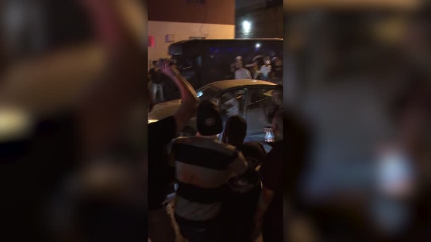 Dramatic Video Shows Car Crashing Into Group of People After Brawl on Street