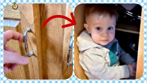 Little boy watches TV inside closed kitchen cabinet｜VideOasis