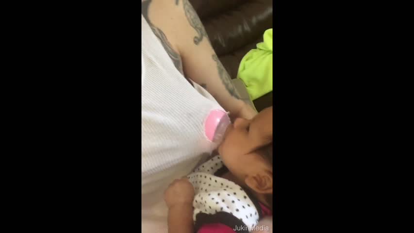 Man Pretends to Breastfeed Daughter