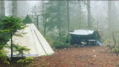 Caught in a Storm alone - camping in heavy rain, portaple wood stove canvas tent, Solo Camping