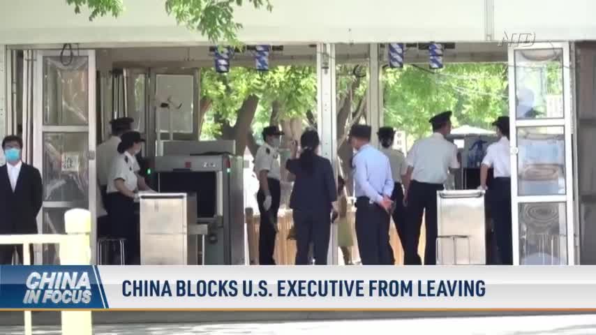 China Blocks US Executive From Leaving