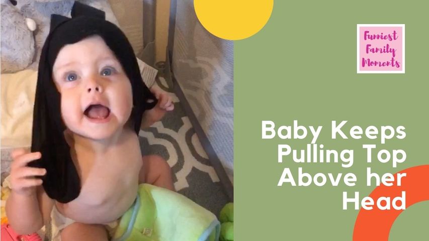 Baby Keeps Pulling Top Above her Head Trying to Wear it Off