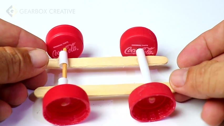 How to Make a Rubber band Car - DIY EASY MADE TOY CAR