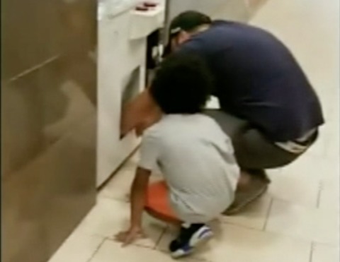 Men sent a girl inside vending machine to steal some products