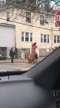 Storyful-195780-TRex_Casually_Walks_Student_Home_From_Pennsylvania_Elementary_School.mp4