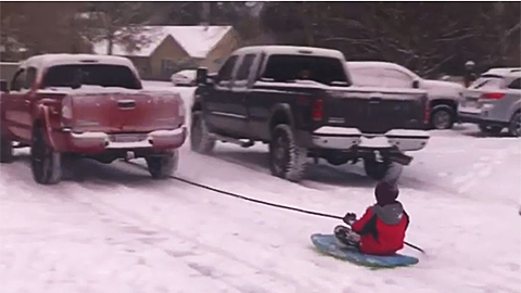 Body Board Converted to Sled as Cold Streak Continues in South Carolina