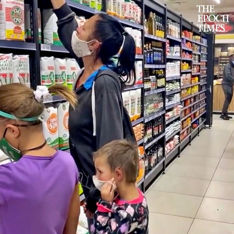 Man Helps A Struggling Mother Who Is Buying A Small Packet Of MaizeMeal For Her Kid