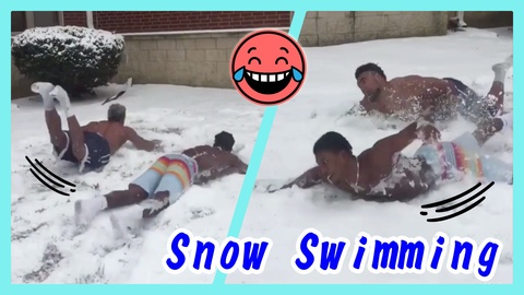 Guys Pretend to Swim Through Snow