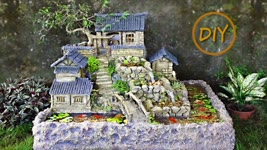 WOW! Very excellent waterfall aquarium with house on the mountain from sryrofoam