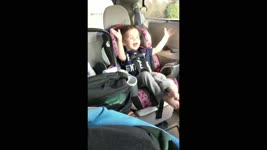 Kid Enjoys Riding in the Car With the Windows Down