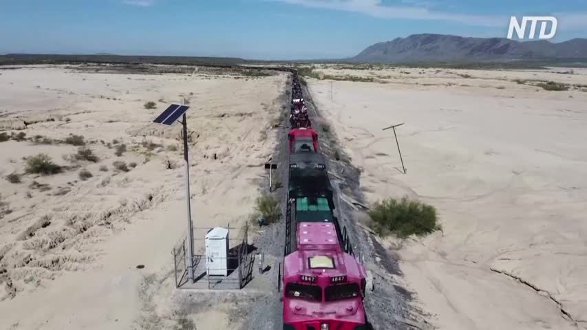 Drone Views Show Illegal Immigrants Heading to US on Board of Cargo Train in Northeast Mexico