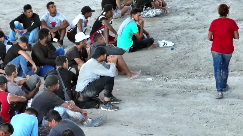 Drone Footage: Large Group of Newly Arrived Illegal Immigrants Wait To Be Processed in Texas