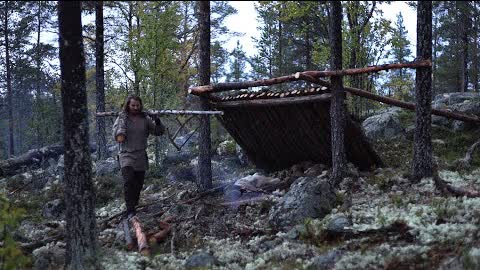 Bushcraft trip - shelter building, boat down river, reindeer skin, meat [lean-to part 1]