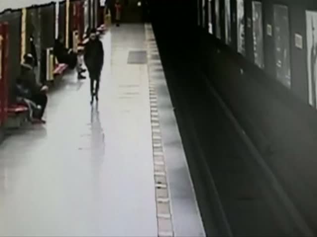Toddler saved by teenager after jumping onto metro tracks